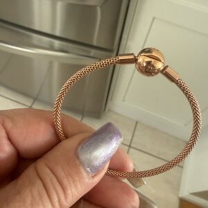 Pandora beautiful flexible rose gold bangle.